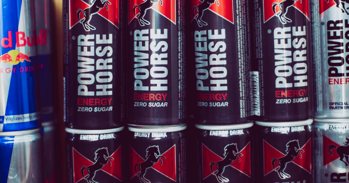 Cans of coloured energy drinks — checking for E120 cochineal and halal status