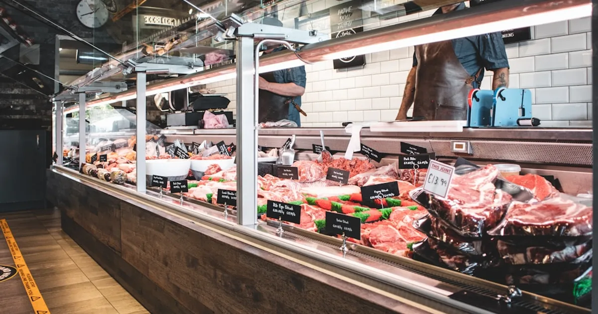 Fresh halal beef and lamb cuts on a butcher's counter, chilled not frozen