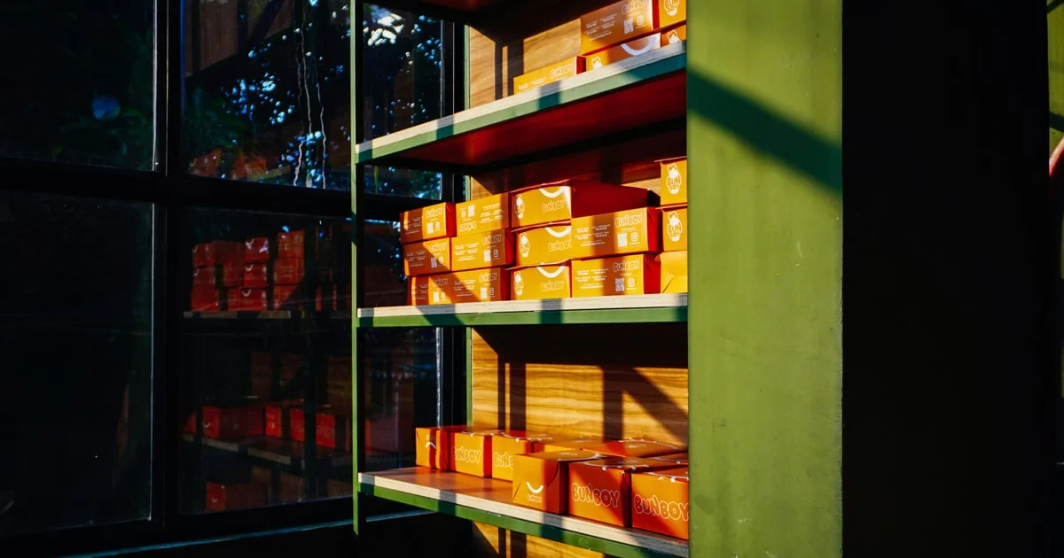 Sliced bread loaves and bakery items on a rack