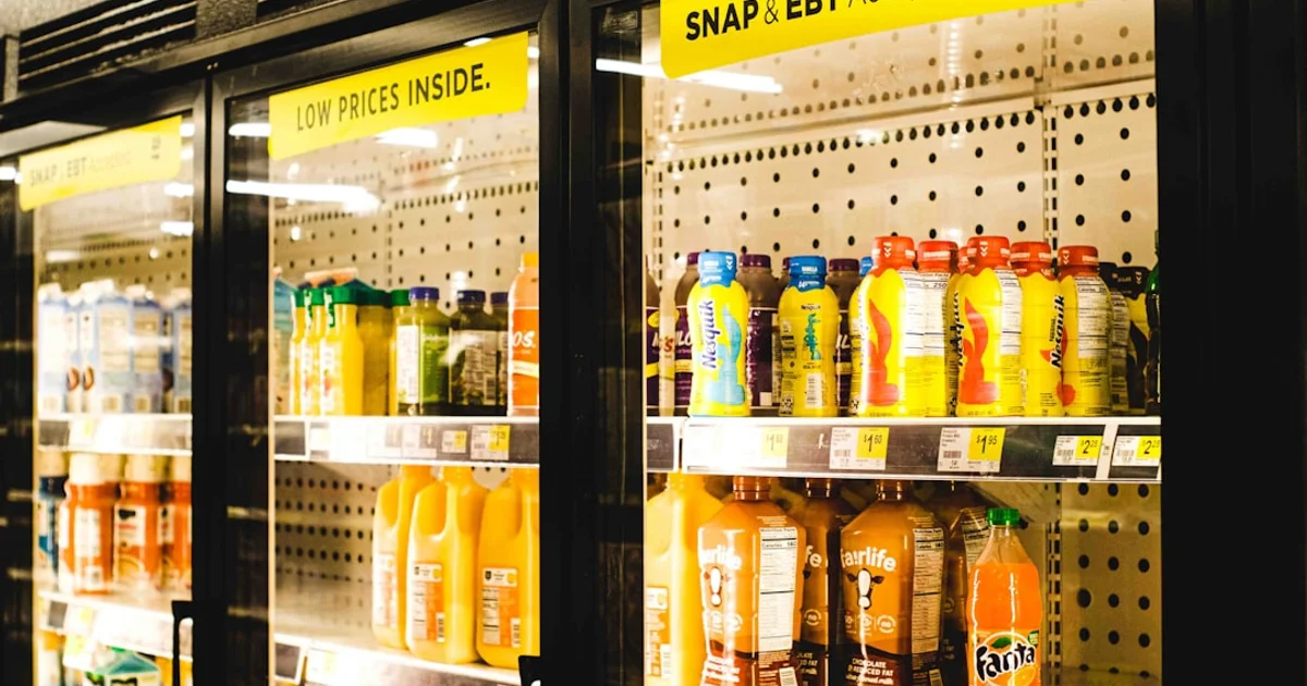Chilled cans and bottles of malt drinks, juices and soft drinks in an Egyptian shop fridge
