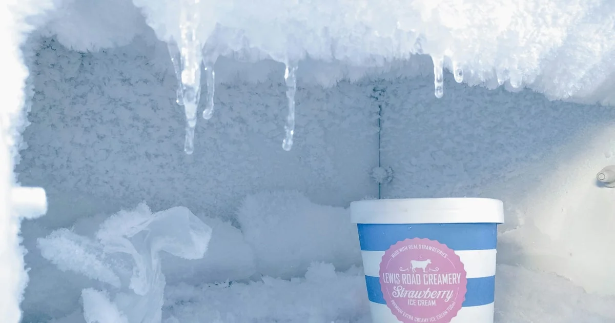 Ice cream tubs stacked in a supermarket freezer