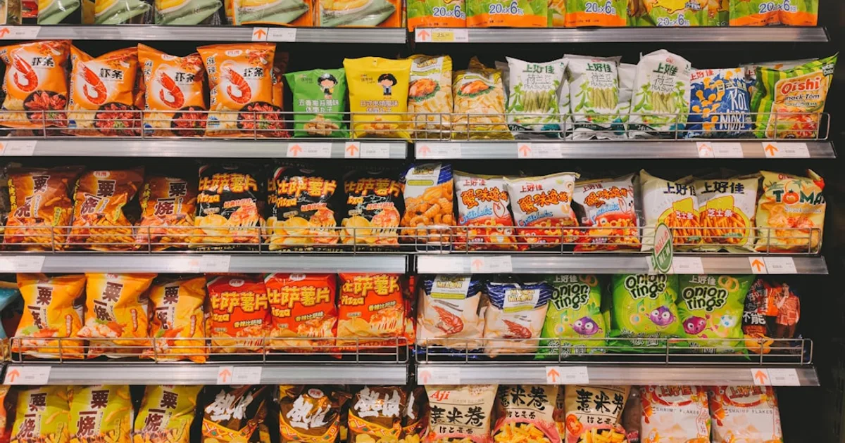 Bags of savoury snacks and crisps on a Singapore supermarket shelf