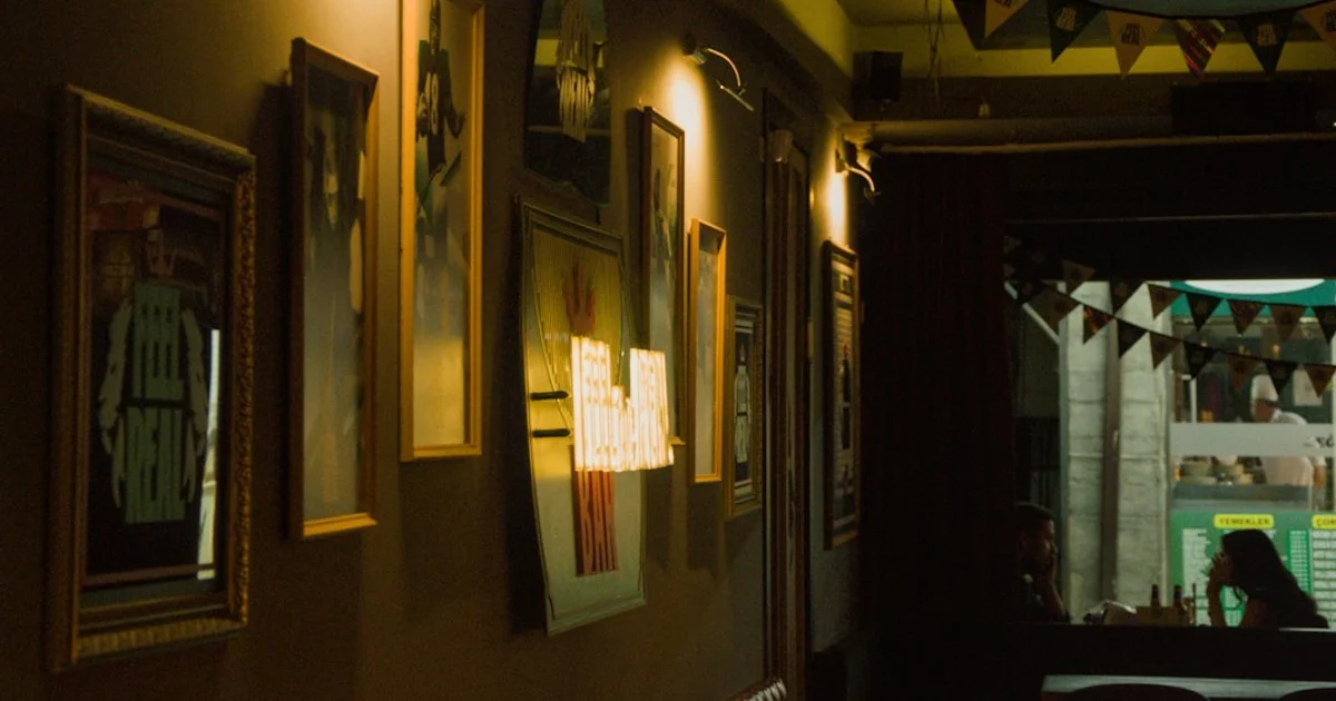 Framed halal certificate on a restaurant wall with a customer reading the dates — how to verify an HFA halal certificate in the UK