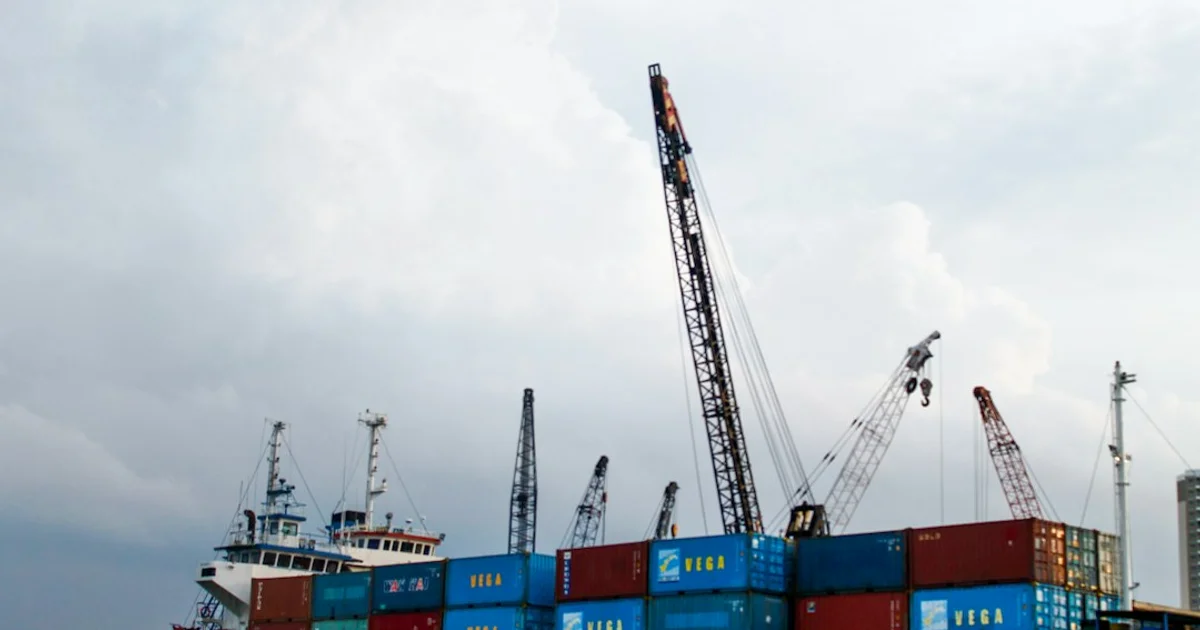 Shipping containers at an Indonesian port — the October 2026 deadline for mandatory halal certification of imported food and cosmetics