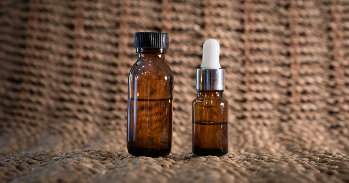 Food ingredients and an alcohol bottle on a kitchen counter — is alcohol in food halal or haram?