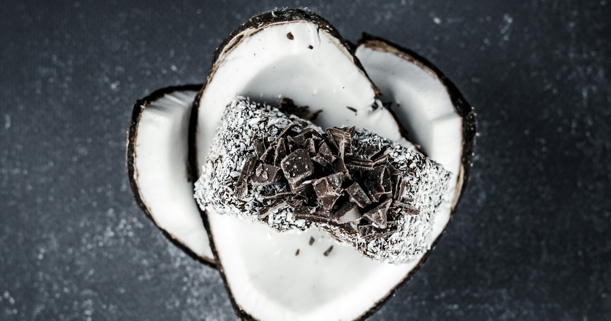 Bounty chocolate bar with coconut filling and dark chocolate coating