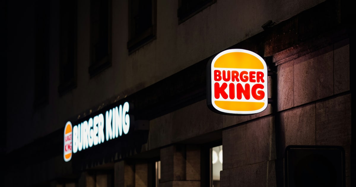 Burger King restaurant storefront with iconic flame-grilled branding