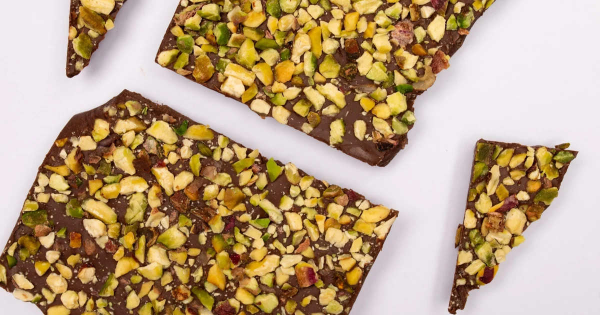Is Dubai chocolate halal — pistachio kunafa chocolate bar broken open showing green filling