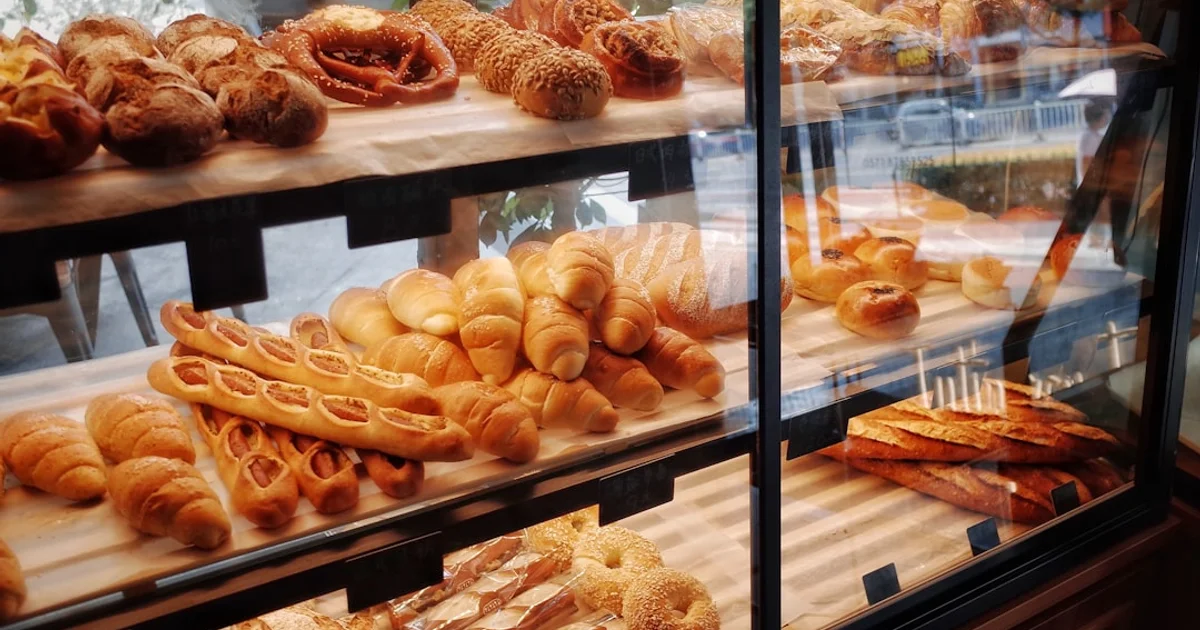 Greggs bakery store front with pastries — halal status guide for Greggs products