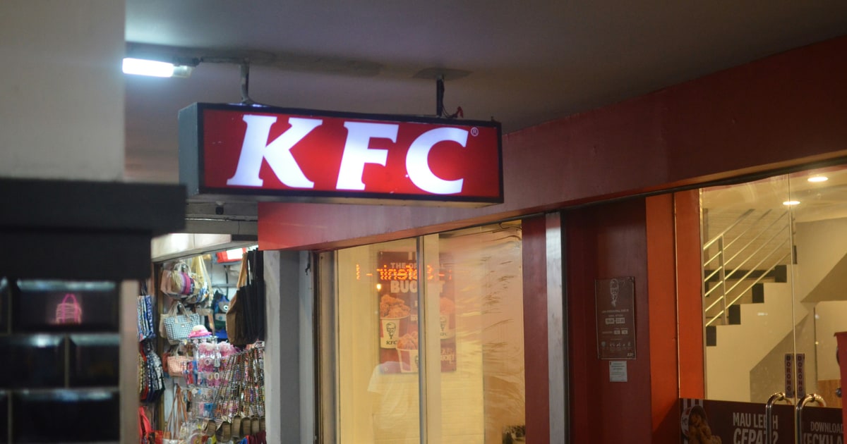 KFC restaurant signage with the Colonel Sanders logo