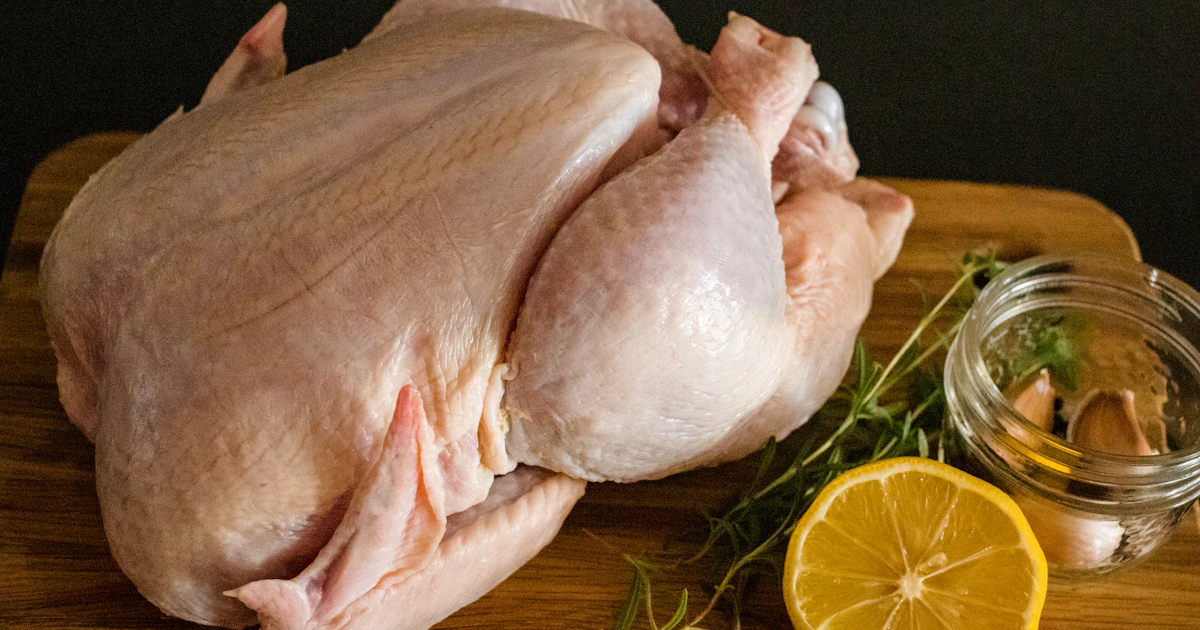 Halal chicken in supermarket with HMC certification logo — machine vs manual slaughter debate