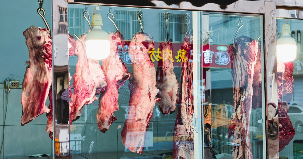 Halal-certified meat at a UK butcher shop with HMC logo displayed