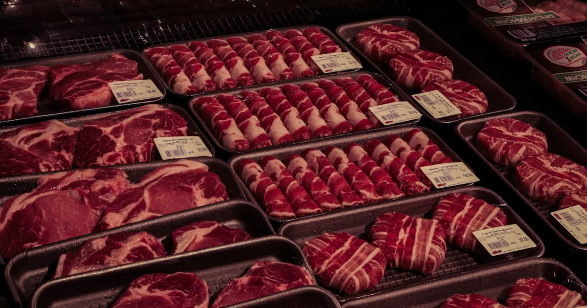 Halal butcher in the US showing zabiha and non-zabiha meat debate labels